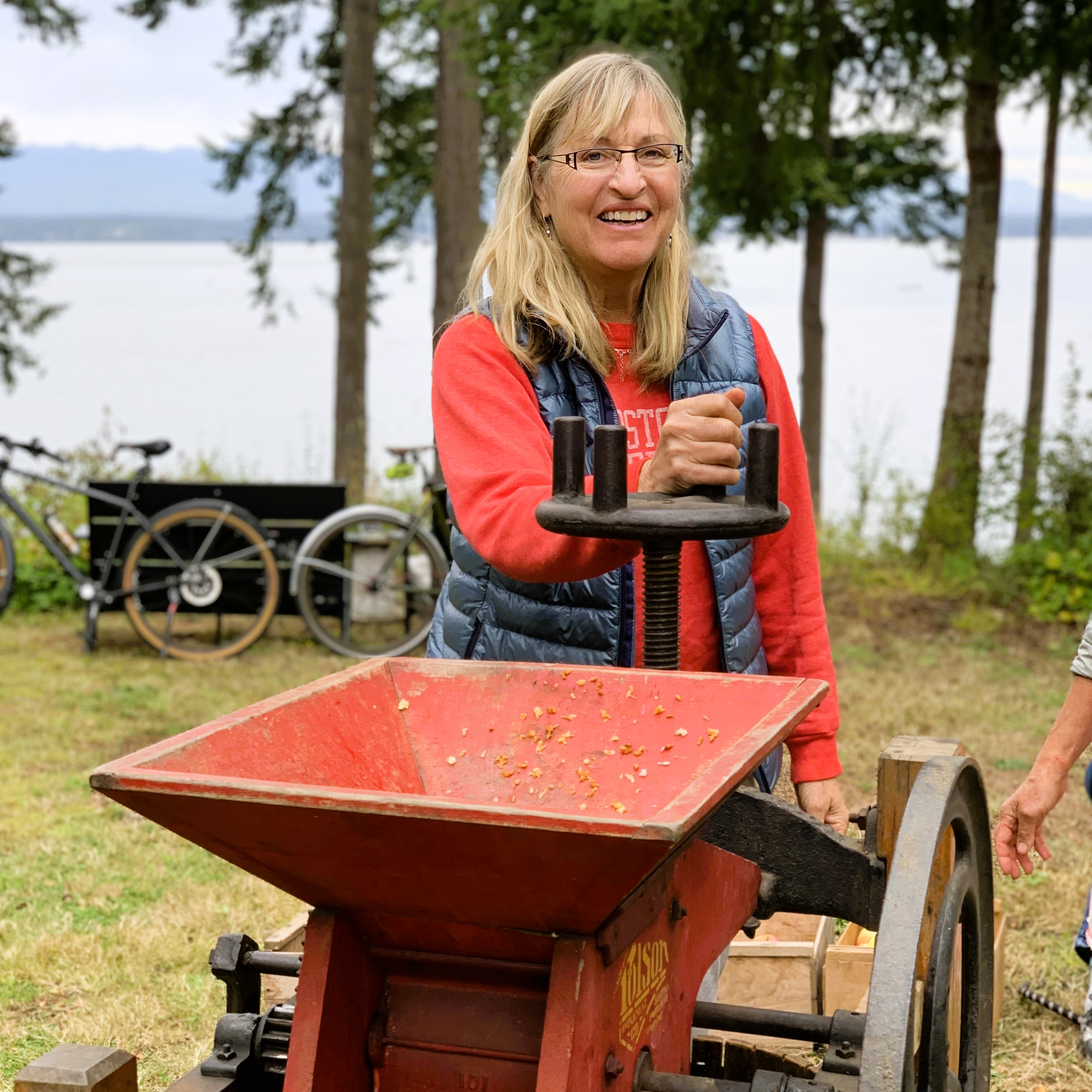 Nancy crushing apples